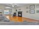 Spacious living room featuring hardwood floors and a cozy fireplace at 1650 Berkshire Dr, Hickory, NC 28602