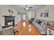 Bright living room with hardwood floors and a classic fireplace at 1650 Berkshire Dr, Hickory, NC 28602