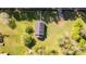 Aerial view of home with well-maintained lawn and mature trees at 212 W Doc Garris Rd, Lancaster, SC 29720