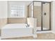 Luxurious bathroom with a soaking tub and glass-enclosed shower at 2275 Laurens Dr, Concord, NC 28027