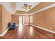Comfortable bedroom featuring a ceiling fan and hardwood floors at 2275 Laurens Dr, Concord, NC 28027