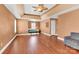 Inviting bedroom with a ceiling fan, hardwood floors, and a cozy bed at 2275 Laurens Dr, Concord, NC 28027
