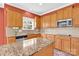 Modern kitchen with granite countertops, stainless steel appliances, and tile backsplash at 2275 Laurens Dr, Concord, NC 28027