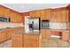 Well-appointed kitchen featuring granite countertops, stainless appliances, and a central island at 2275 Laurens Dr, Concord, NC 28027