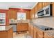 Updated kitchen featuring stainless steel appliances, granite countertops, and ample cabinet space at 2275 Laurens Dr, Concord, NC 28027