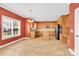 Bright eat-in kitchen featuring granite countertops, stainless steel appliances, and ample cabinet space at 2275 Laurens Dr, Concord, NC 28027