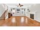 Bright living room boasting hardwood floors, a fireplace, and plenty of natural light through large windows at 2275 Laurens Dr, Concord, NC 28027