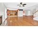 Open floor plan showcasing hardwood floors, seamlessly connecting the living room to the kitchen at 2275 Laurens Dr, Concord, NC 28027