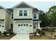 Charming two-story home with a one car garage and landscaped front yard at 248 Laura Elizabeth Ln, Clover, SC 29710