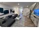 A bright living room featuring modern decor, stylish furniture, and hardwood floors at 248 Laura Elizabeth Ln, Clover, SC 29710