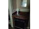 A close-up of a kitchen corner with a dark countertop and a black dishwasher below at 2547 Gastonia Hwy, Lincolnton, NC 28092