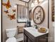 Charming bathroom with vanity, mirror and butterfly decorations at 2614 Reepsville Rd, Lincolnton, NC 28092