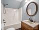 Bathroom features blue walls, vanity, toilet, and tub/shower combo at 2614 Reepsville Rd, Lincolnton, NC 28092