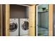 Laundry room features white washer and dryer at 2614 Reepsville Rd, Lincolnton, NC 28092