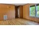 Inviting living room featuring wood-look flooring, and natural light streaming through the windows at 2614 Reepsville Rd, Lincolnton, NC 28092