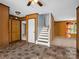 The living room features stairs to the upper level, a closet, and tiled floors at 2614 Reepsville Rd, Lincolnton, NC 28092