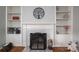 Elegant fireplace with white mantel and built-in shelves creates a cozy focal point in the room at 2617 Brookwood Rd, Lincolnton, NC 28092