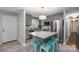 Modern kitchen with stainless steel appliances, granite countertops, and a stylish center island at 2617 Brookwood Rd, Lincolnton, NC 28092