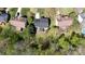 Aerial view of the property showcasing the home's layout, surrounding greenery, and neighborhood at 2815 Providence Spring Ln, Charlotte, NC 28270