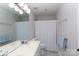 Bathroom featuring double sinks, a large mirror, and fresh blue towels at 2815 Providence Spring Ln, Charlotte, NC 28270