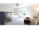 Comfortable bedroom with natural light, neutral decor, and ample space at 2815 Providence Spring Ln, Charlotte, NC 28270
