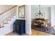 Traditional dining room featuring hardwood floors, classic furnishings, and a stairway to the left at 2815 Providence Spring Ln, Charlotte, NC 28270