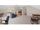 Large and carpeted bonus room with a television and comfortable seating at 301 Prairie Rose Ct, Waxhaw, NC 28173