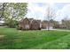 Charming brick two-story home with well-manicured lawn and inviting curb appeal at 301 Prairie Rose Ct, Waxhaw, NC 28173