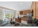 Traditional kitchen with light-wood cabinetry, stainless steel appliances and a breakfast nook with large windows at 301 Prairie Rose Ct, Waxhaw, NC 28173
