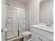 Modern bathroom features a glass-enclosed shower and stylish fixtures at 3036 Whipcord Dr, Waxhaw, NC 28173