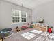 Bright playroom with lots of natural light and colorful toys at 3036 Whipcord Dr, Waxhaw, NC 28173
