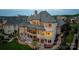 Large luxury home featuring an outdoor patio, fire pit, garden landscaping, and gorgeous stone and brick elevation at 325 Ivy Arbor Cir, Rock Hill, SC 29732