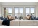 Bright living room featuring a lake view, slider doors to the deck, and comfortable seating at 325 Ivy Arbor Cir, Rock Hill, SC 29732