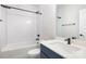 Clean bathroom featuring white subway tile, modern fixtures, and a combined shower and tub at 3526 Saker Ln, Charlotte, NC 28211