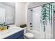 Well-lit bathroom features modern fixtures, a shower-tub combo, and a stylish vanity at 3526 Saker Ln, Charlotte, NC 28211