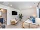Inviting bedroom with a cozy daybed, stylish decor, and convenient access to an en-suite bathroom at 3526 Saker Ln, Charlotte, NC 28211