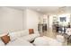 Cozy living room showing sofa, kitchen, dining area, and staircase at 3526 Saker Ln, Charlotte, NC 28211