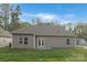 The backyard offers a well-manicured lawn and a patio for outdoor enjoyment at 3708 Small Ave, Charlotte, NC 28269