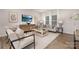 Bright living room with a comfortable seating area, modern decor, and natural light, creating a welcoming space at 3708 Small Ave, Charlotte, NC 28269
