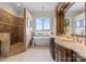Luxurious bathroom with soaking tub, walk-in shower, double vanity, and water view at 3988 Channel Point Ln, Denver, NC 28037