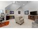 Cozy bonus room showcasing vaulted ceilings, recessed lighting, plush carpeting, and a comfortable sitting area at 3988 Channel Point Ln, Denver, NC 28037