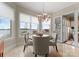 Charming breakfast nook with lake views, a round table, and plenty of natural light at 3988 Channel Point Ln, Denver, NC 28037