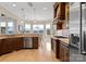 Gourmet kitchen with stainless steel appliances, granite countertops, and views of the lake at 3988 Channel Point Ln, Denver, NC 28037