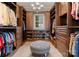 Spacious walk-in closet featuring custom shelving and storage solutions at 3988 Channel Point Ln, Denver, NC 28037