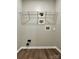 Laundry room with storage shelves at 4418 Palustris Ct, Charlotte, NC 28269