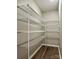 Walk-in pantry featuring ample metal shelving for storage at 4418 Palustris Ct, Charlotte, NC 28269