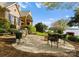 Charming backyard patio featuring a grill area and comfortable seating near the lake at 4628 Sierra View Dr, Denver, NC 28037