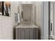This sophisticated powder room showcases a stylish mirror, vanity, and eye-catching wallpaper at 4628 Sierra View Dr, Denver, NC 28037
