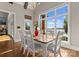 Dining room with windows and sliding glass doors providing water views at 4628 Sierra View Dr, Denver, NC 28037