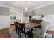 Beautiful dining area with light fixture and natural light makes for a welcoming place to dine at 4628 Sierra View Dr, Denver, NC 28037